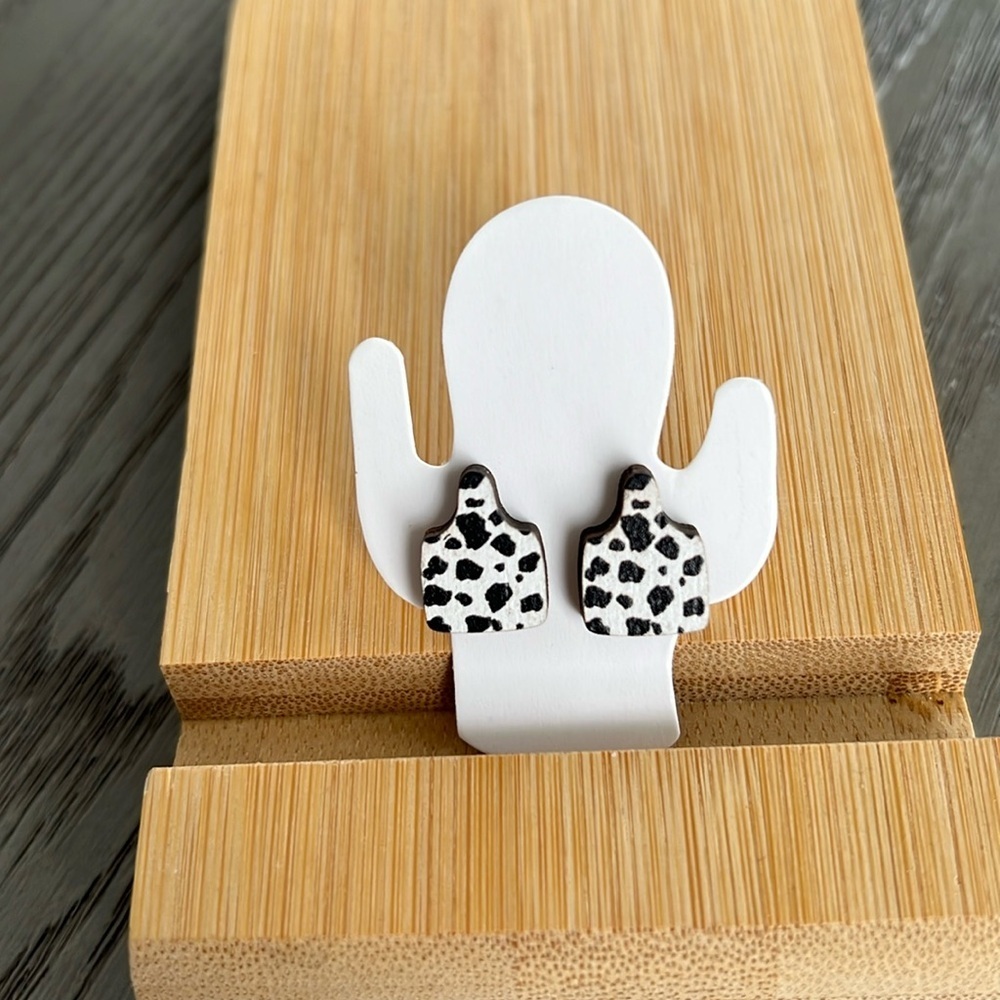 Brand new cow tag earrings​